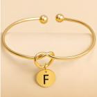 F / Goud